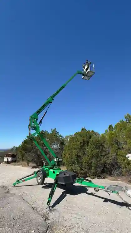 JLG T350 towable boom lift raised to working height